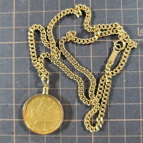 メイプルリーフ1/2oz.K18ヘッダー喜平チェーン付き全重量40g