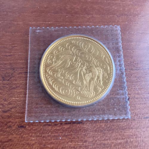 天皇在位60年記念10万円金貨