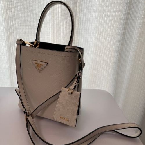 サフィアーノレザースモールバッグ白