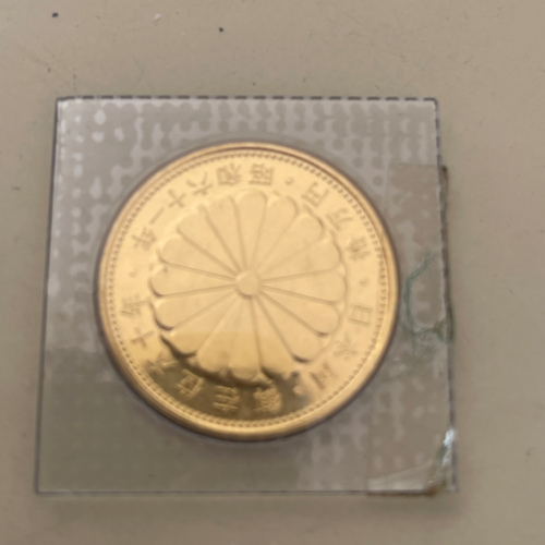 天皇陛下御在位60年記念 10万円金貨の画像