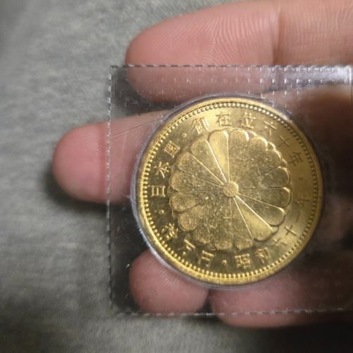 天皇陛下御在位60年記念 10万円金貨