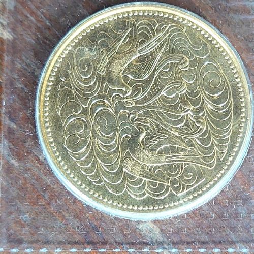 天皇陛下御在位60年記念10在万円金貨