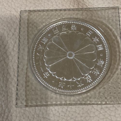 天皇陛下御在位60年記念1万円銀貨